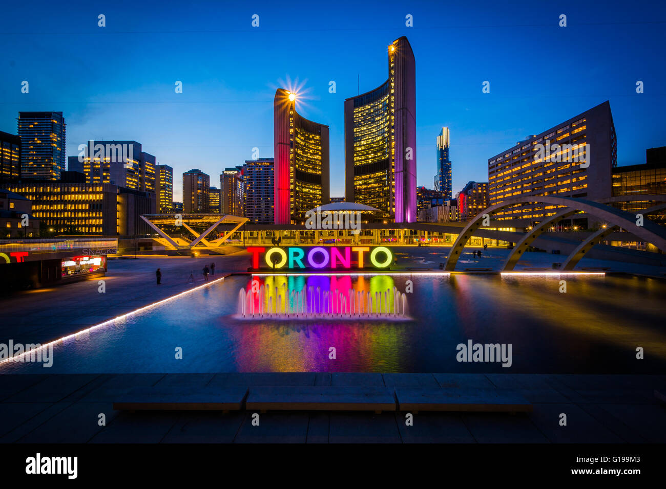View of Nathan Phillips Square and Toronto Sign in downtown at night Stock Photo, Royalty Free