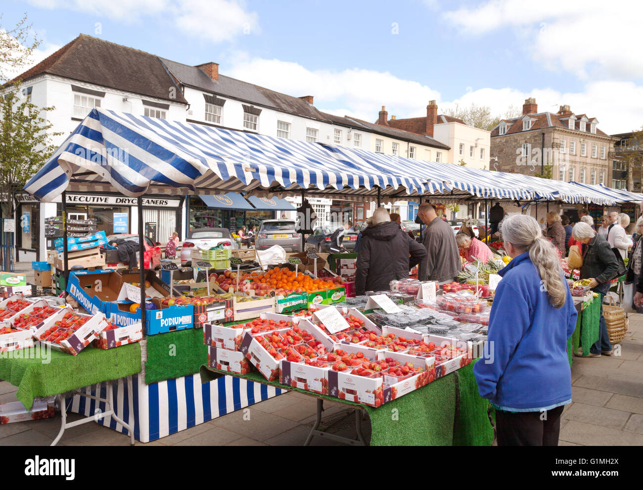 People shopping at Warwick market; the Market Place, Warwick town Stock