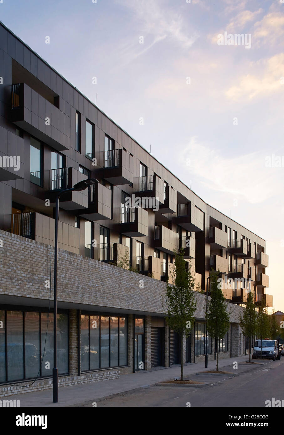 Facade perspective with protruding balconies and sunset sky Facade perspective with protruding balconies and sunset sky