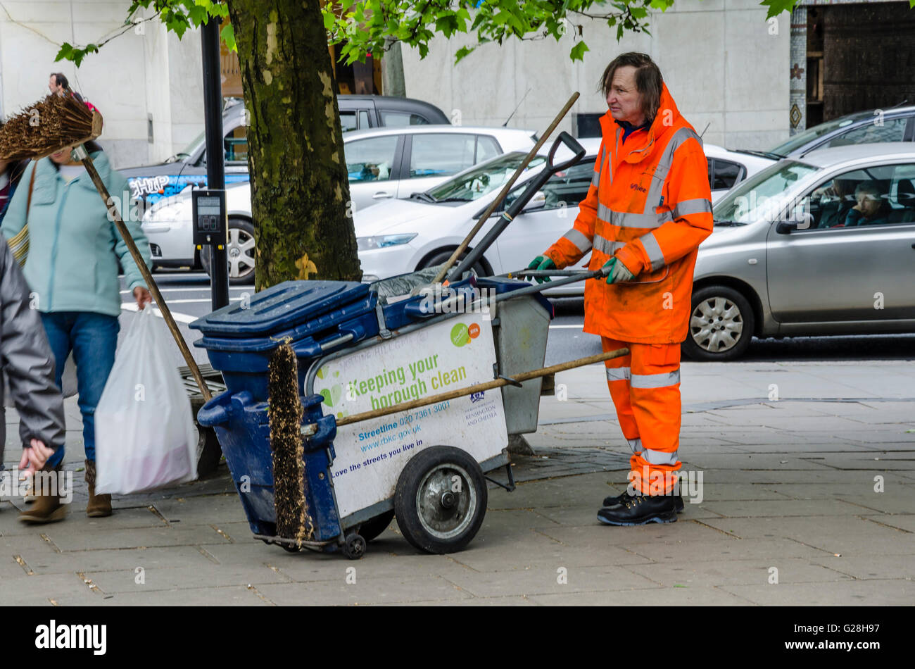 A street cleaner with his cleaning cart Stock Photo, Royalty Free Image