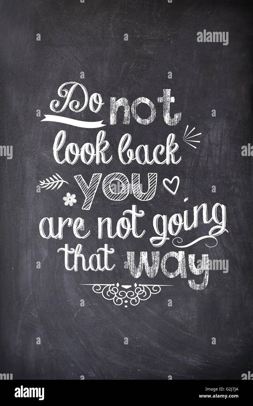 Motivational quote written with chalk on a blackboard Stockfoto