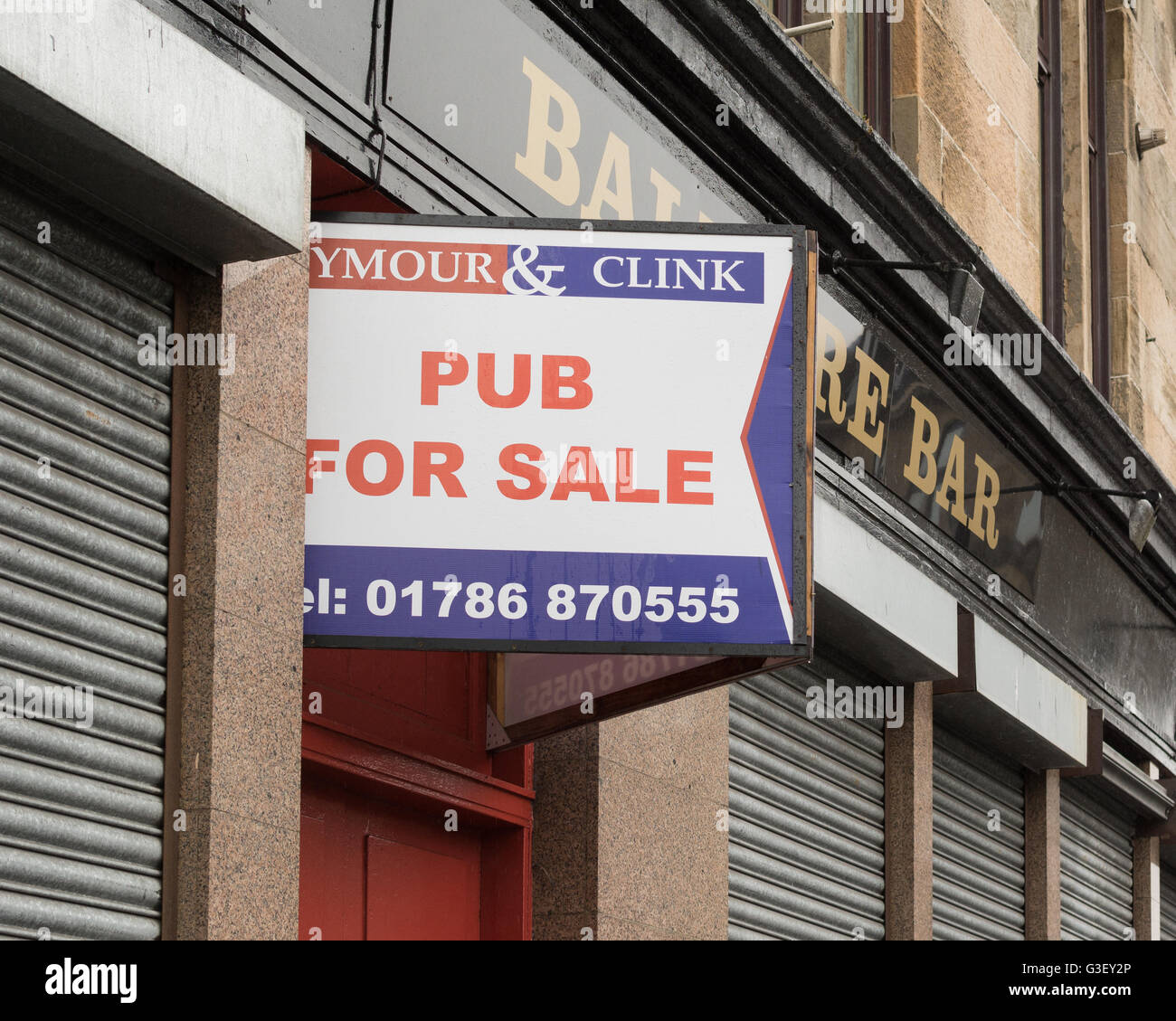 Pub for Sale sign outside the Balmore Bar, in Possilpark, Glasgow Stock