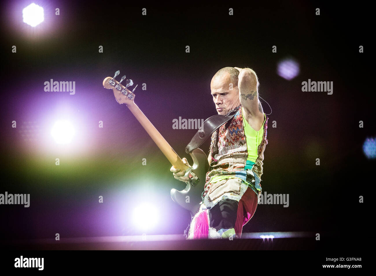 Flea Of The American Funk Rock Band Red Hot Chili Peppers Pictured On Stage As He Performs Live