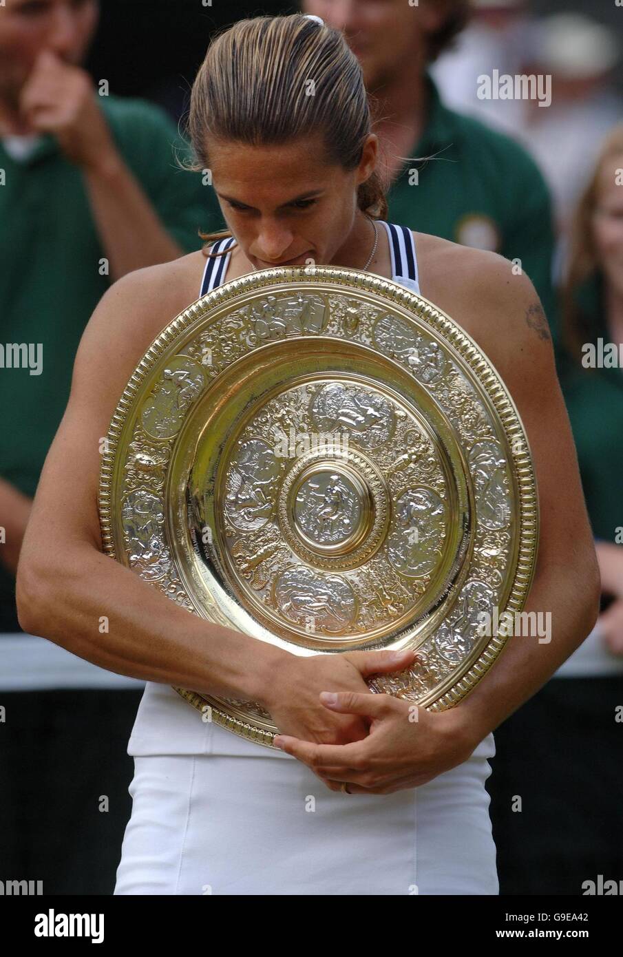 France S Amelie Mauresmo Celebrates With Her Trophy After Winning The