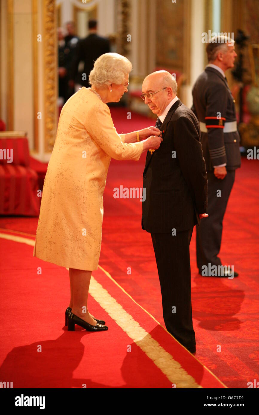 Receives An Obe From The Queen At Buckingham Palace Hi Res Stock