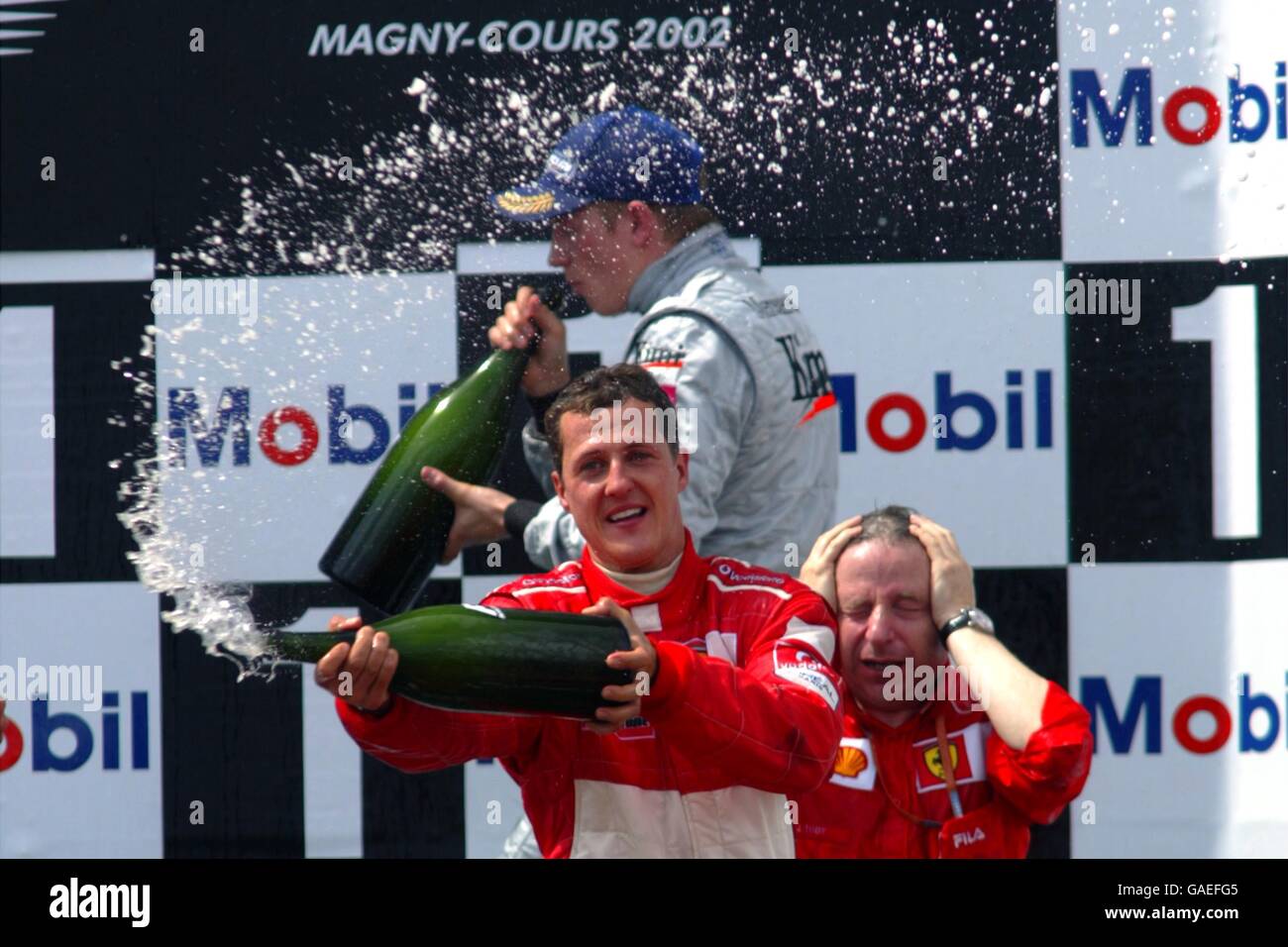 Ferrari S Michael Schumacher Sprays The Victory Champagne In Front Of