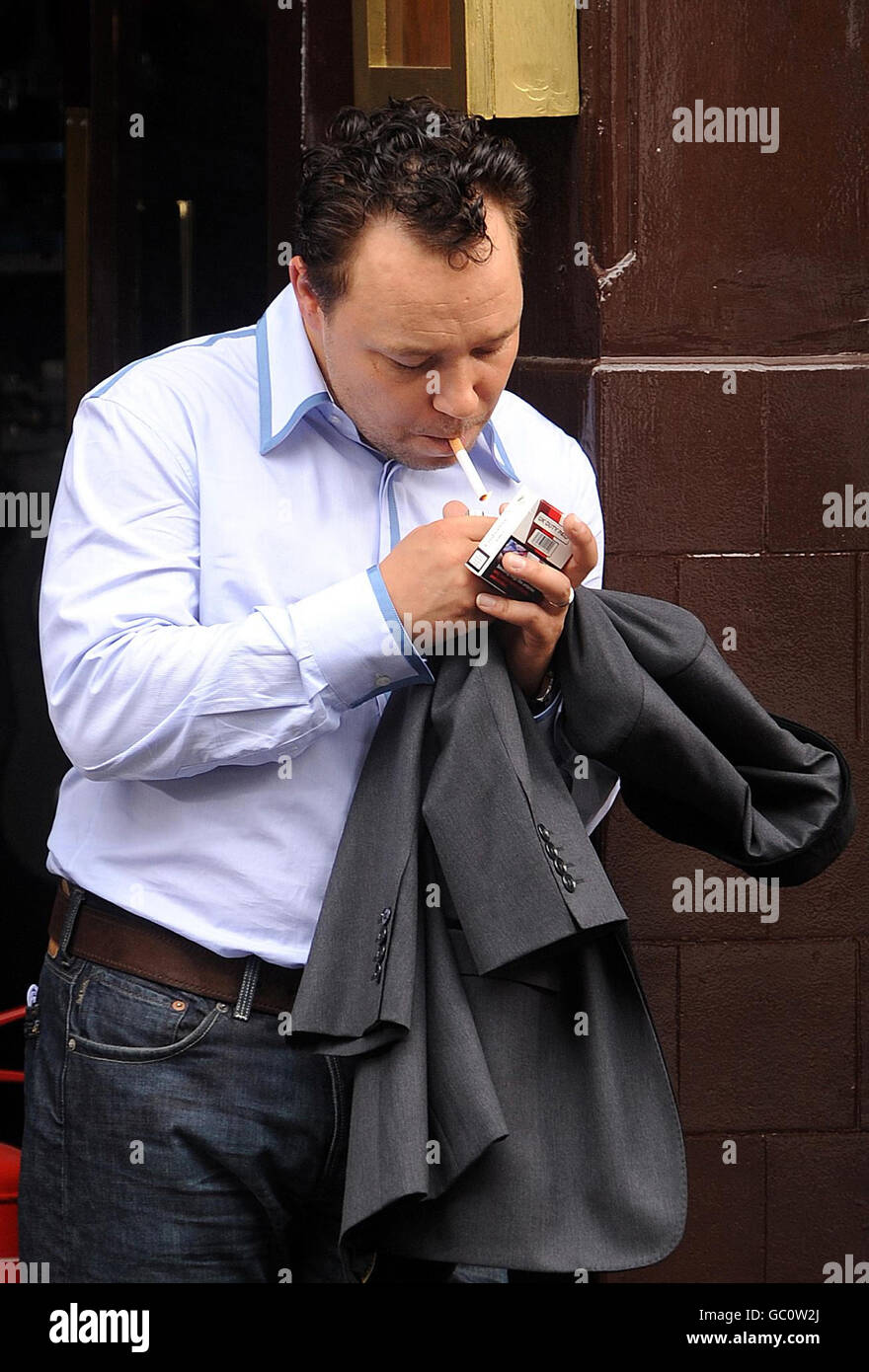 Stephen Graham smoking a cigarette (or weed)
