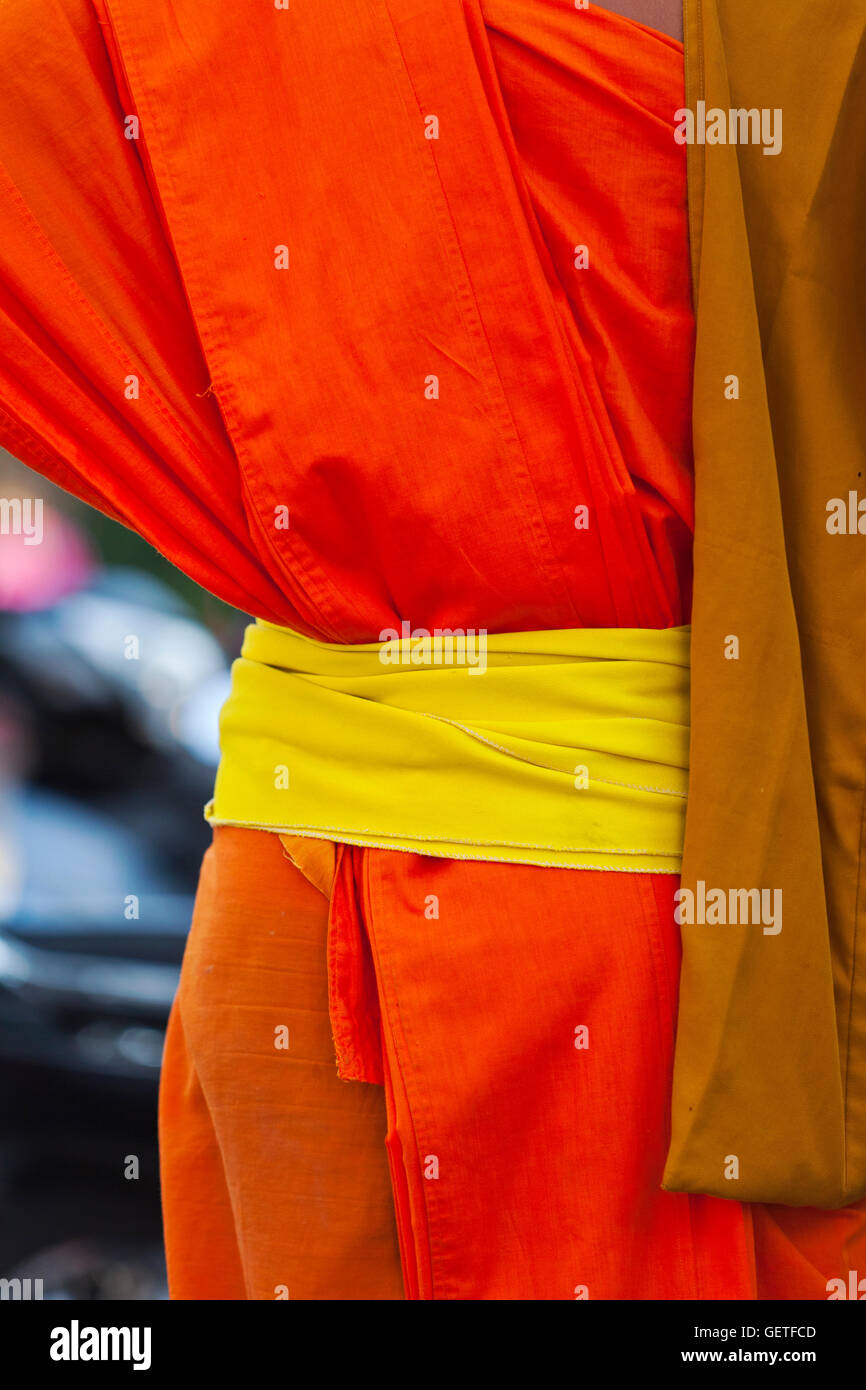 A Close Up Of The Traditional Orange Robes Worn By Buddhist Monks Stock