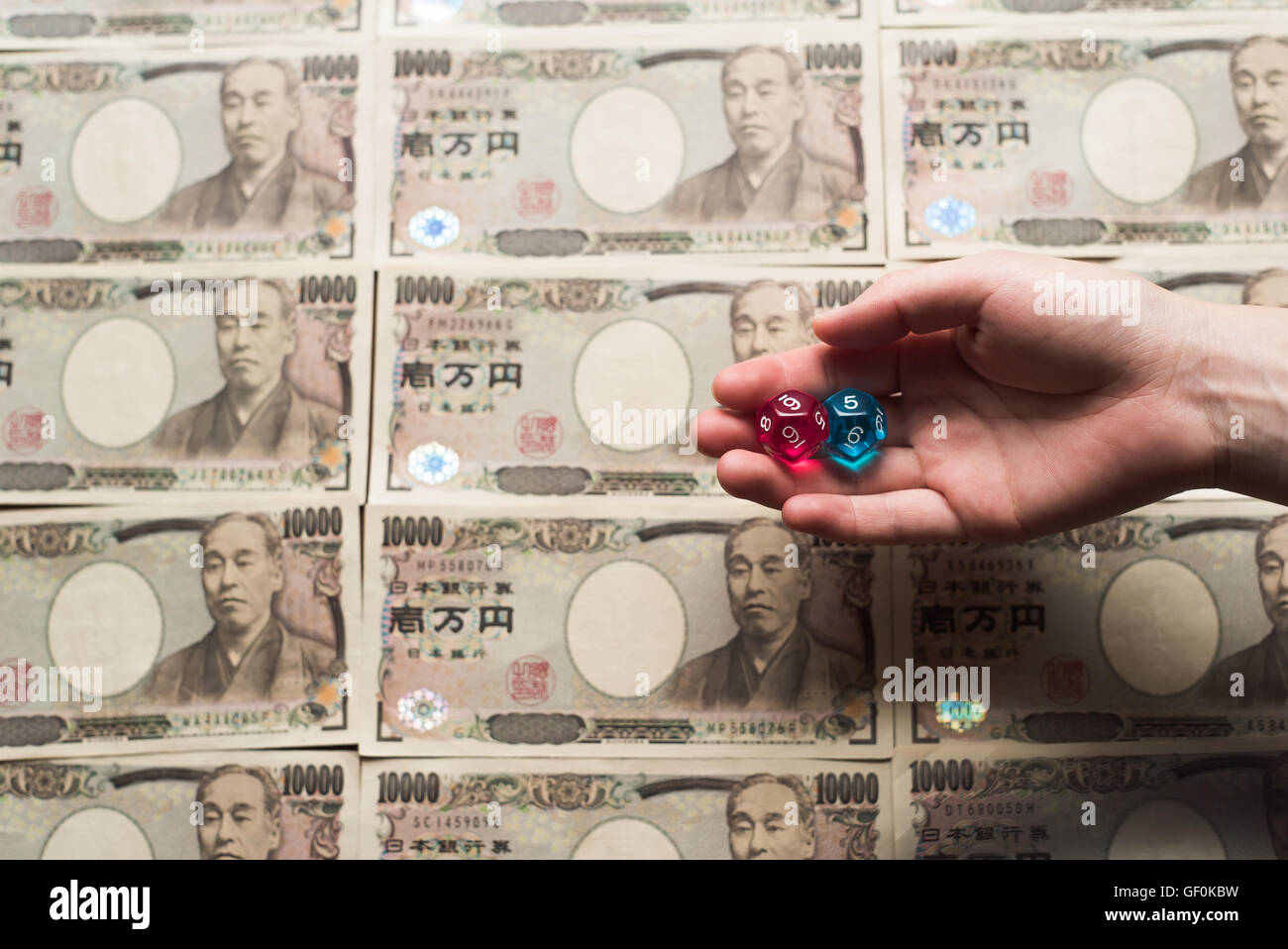 Dices And Ten Thousands Japanese Yen Bills Stock Photo Alamy