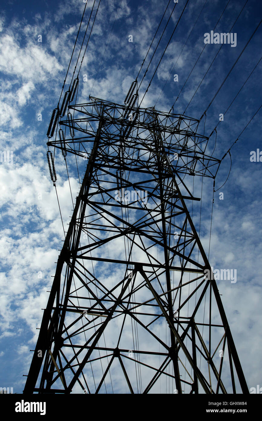 tower of power, large metal power lines and poles provide power for Stock Photo, Royalty Free