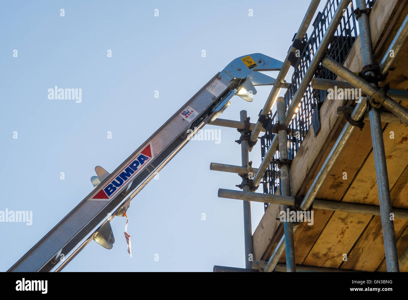 Bumpa tile hoist/lift on a house build project. In Louth Stock Photo