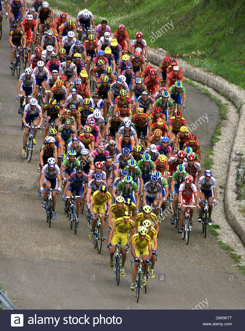 The mercatone uno team leads the pack as they ride on the taburno ...