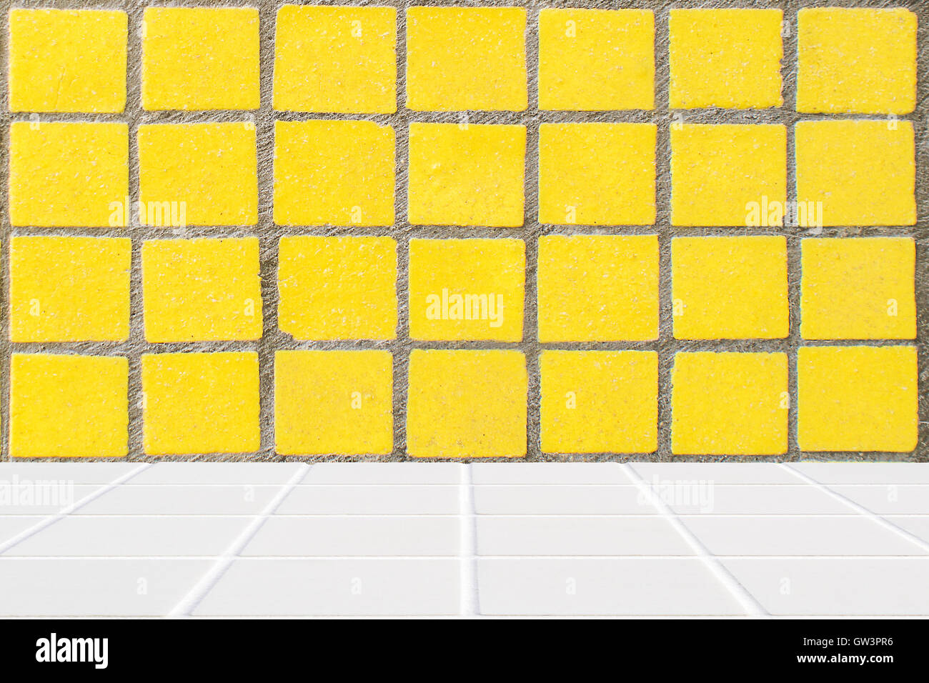 architectural background made of white mosaic floor and yellow mosaic