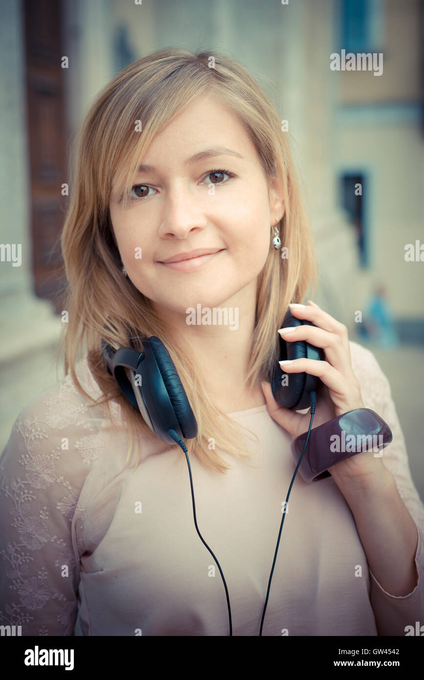 Beautiful Blonde Woman Listening To Music Stock Photo Alamy