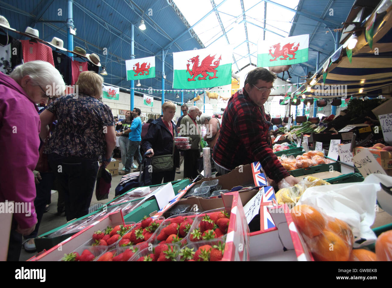 Shoppers inside Abergavenny Market hall during a busy trading day Stock