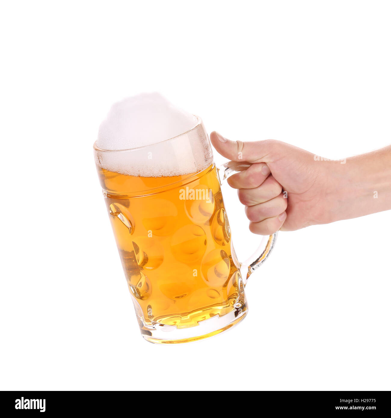 Mug Of Beer With Froth In Hand Stock Photo Alamy