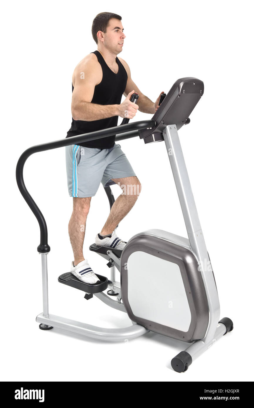 one man doing step machine exercise Stock Photo, Royalty Free Image