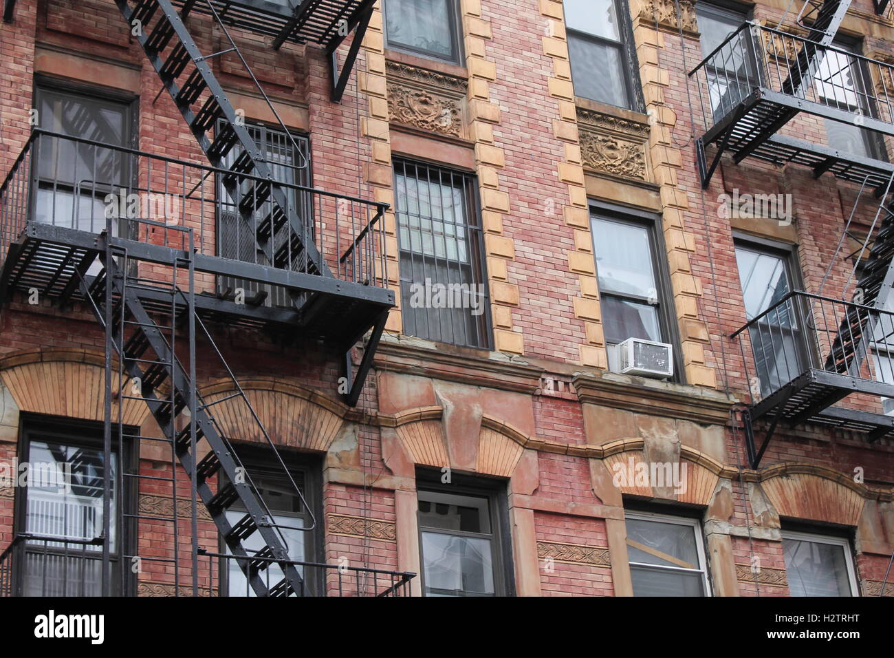 Old red brick apartment building in New York City Stock Photo, Royalty