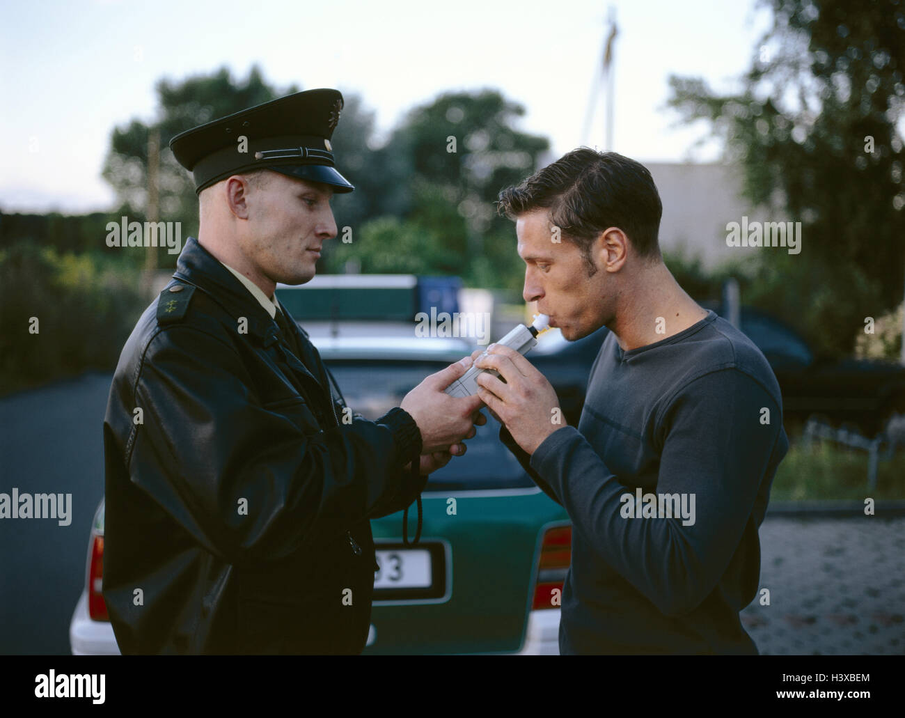 Traffic check, breathalyzer test, policeman, Alkomat, driver, blow