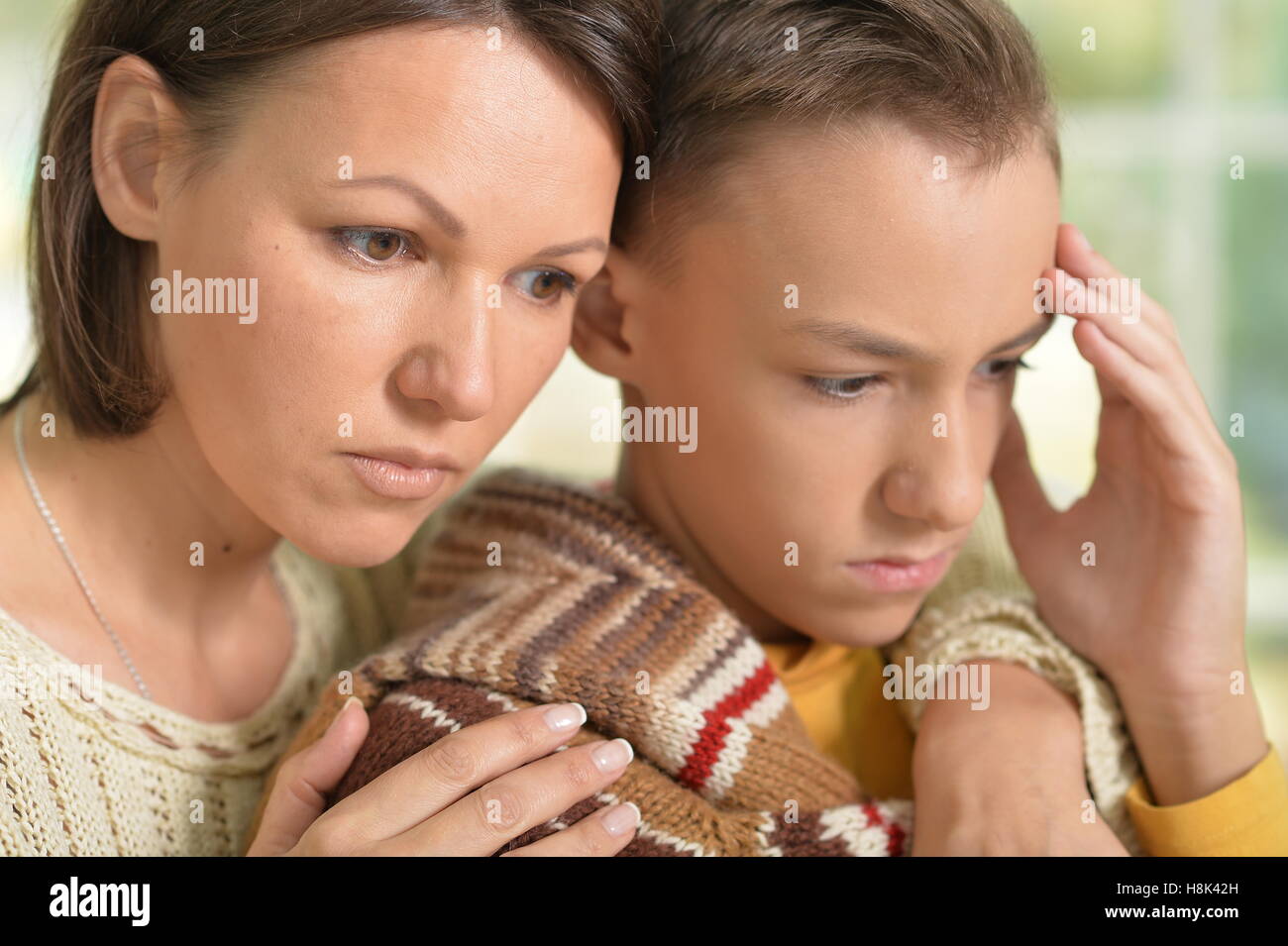 Serious Mother And Son Stock Photo Alamy