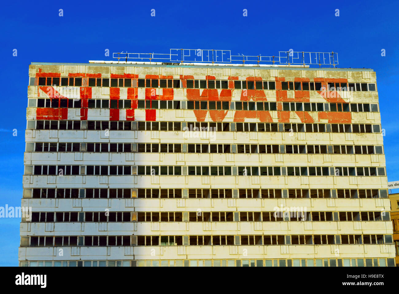 Stop wars graffiti wall art on a facade of a house in berlin alexanderplatz formerly known as haus der statistik berlin germany