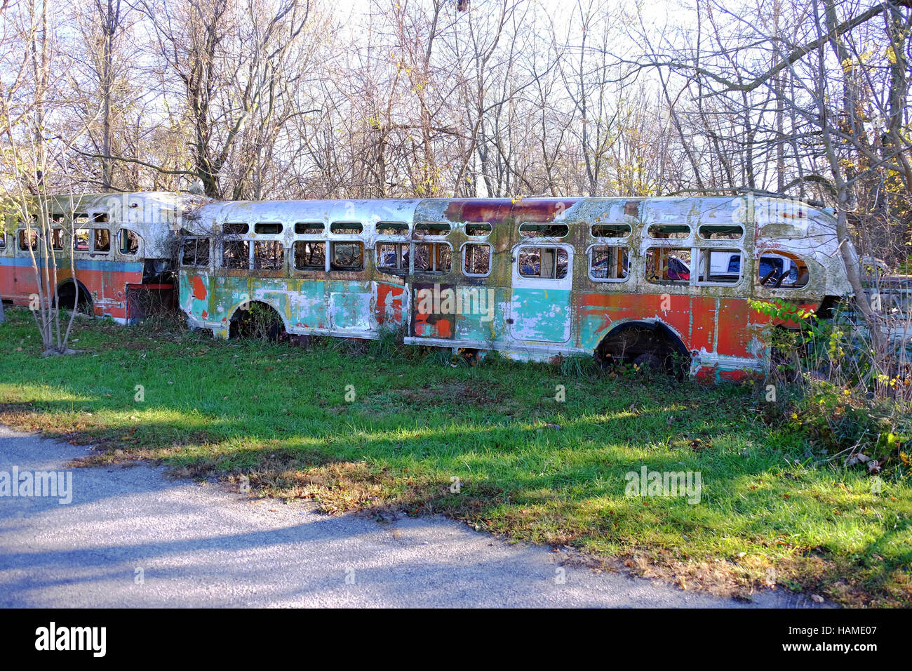 An old city bus is abandoned in a junkyard in Frankfort, Indiana Stock