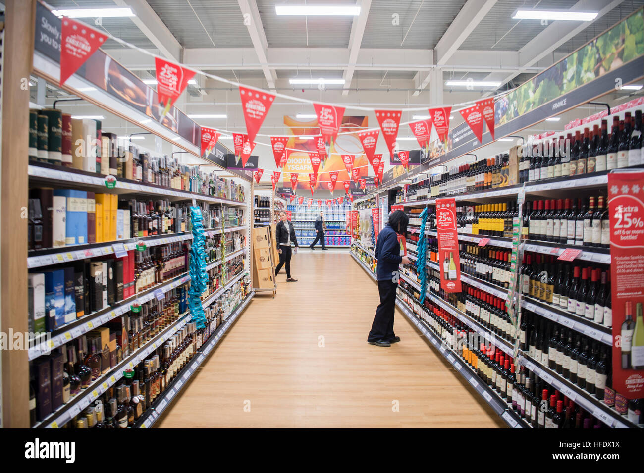 People shopping in the Tesco supermarket superstore, Aberystwyth Stock