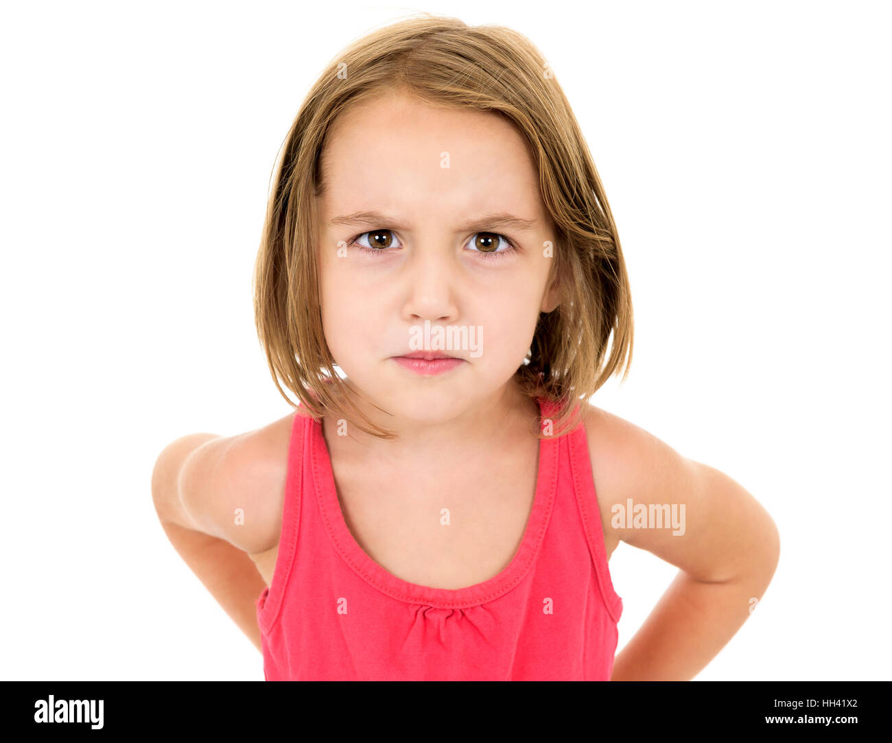 little-girl-is-angry-mad-and-looking-at-the-camera-emotion-face-stock