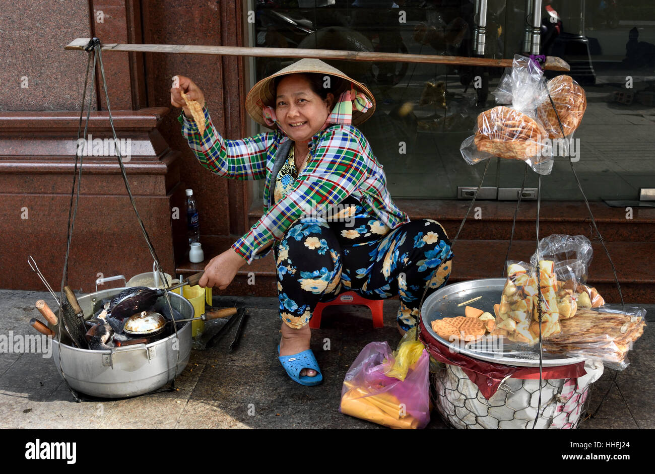 Stock Photo - Street Food Night Market Ho Chi Minh City Center (HCMC) Saigon ( dizzying high octane city of trade commerce and culture) Socialist Republic of Vietnam