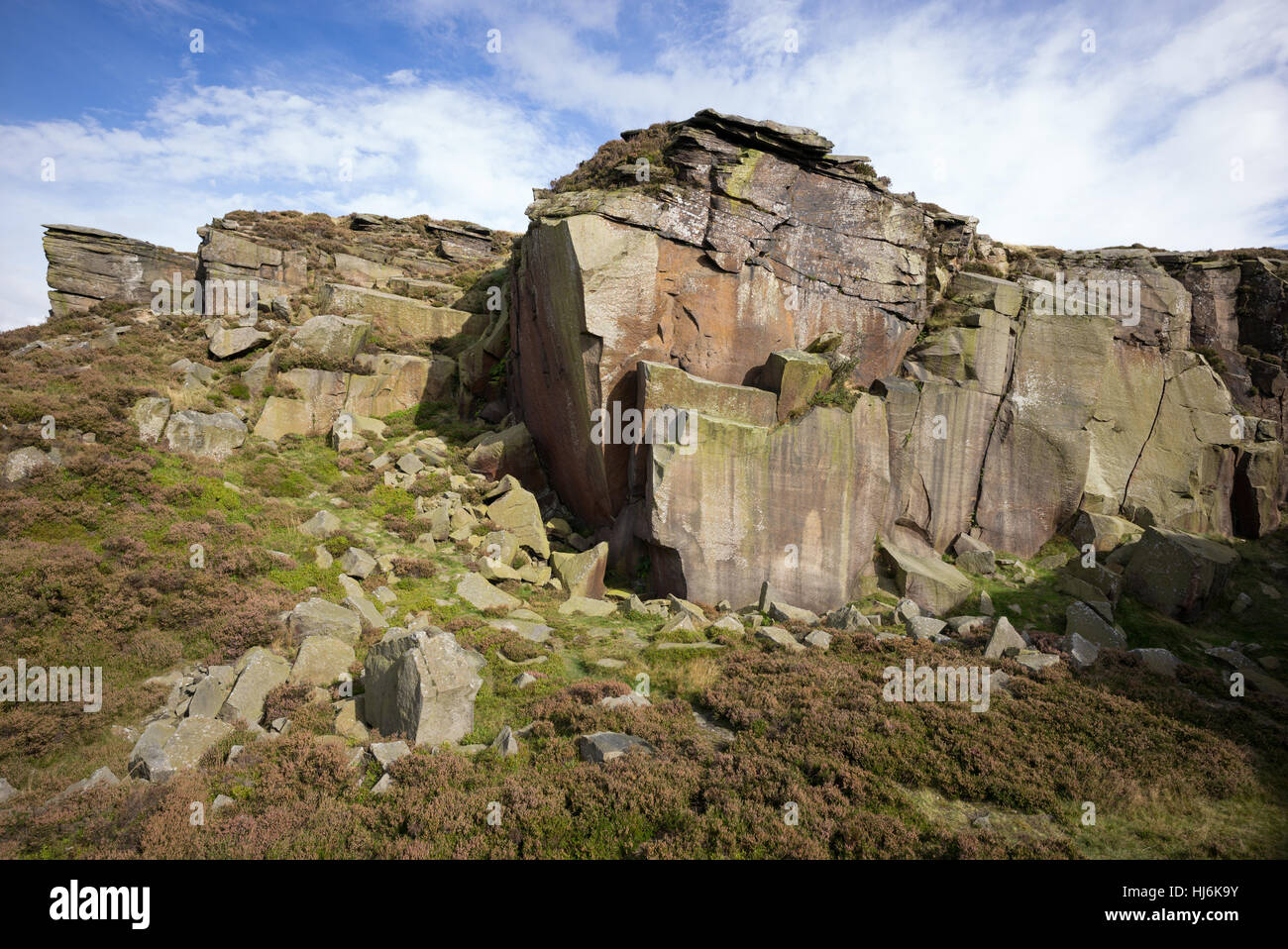 Millstone Grit cliff face in abandoned quarry, Peak District National