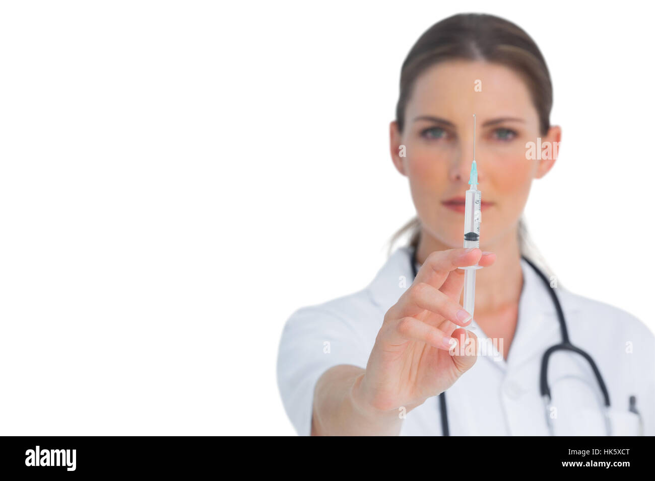 Nurse Holding A Syringe On White Background Stock Photo Alamy