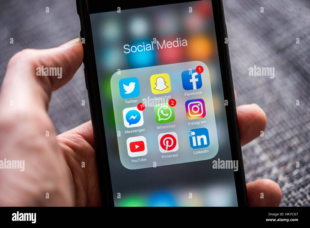Social media app icons displayed on Apple iPhone Stock Photo, Royalty