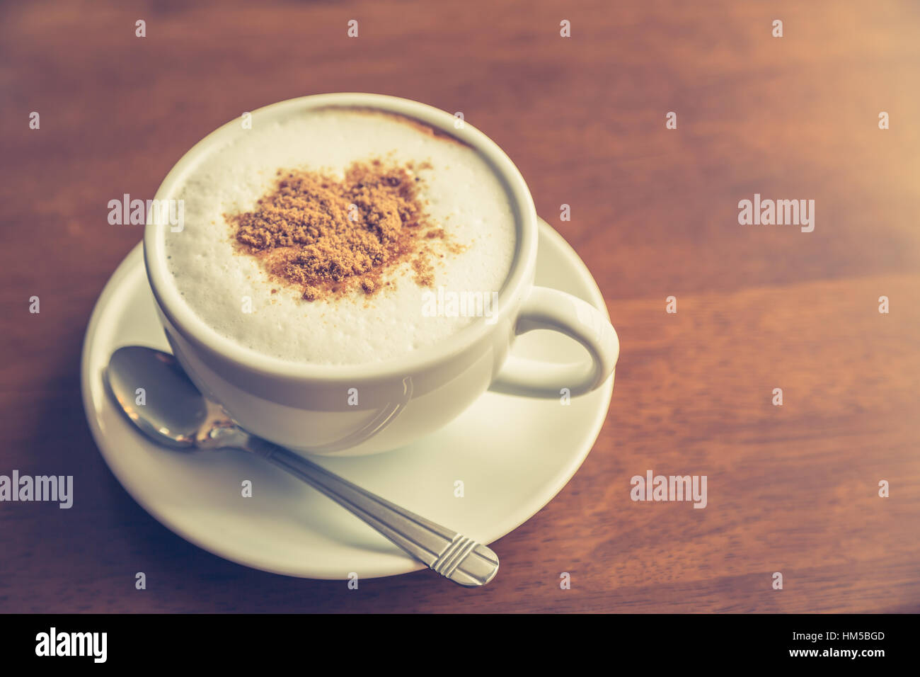 Hot Latte Art Coffee On Table Filtered Image Processed Vintage Effect