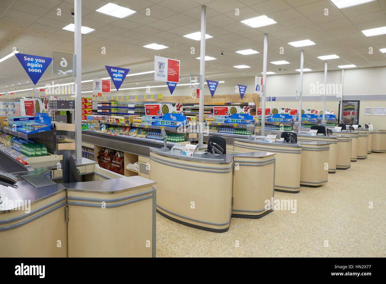 Interior of the checkouts and tills at discount shopping supermarket Stock Photo, Royalty Free