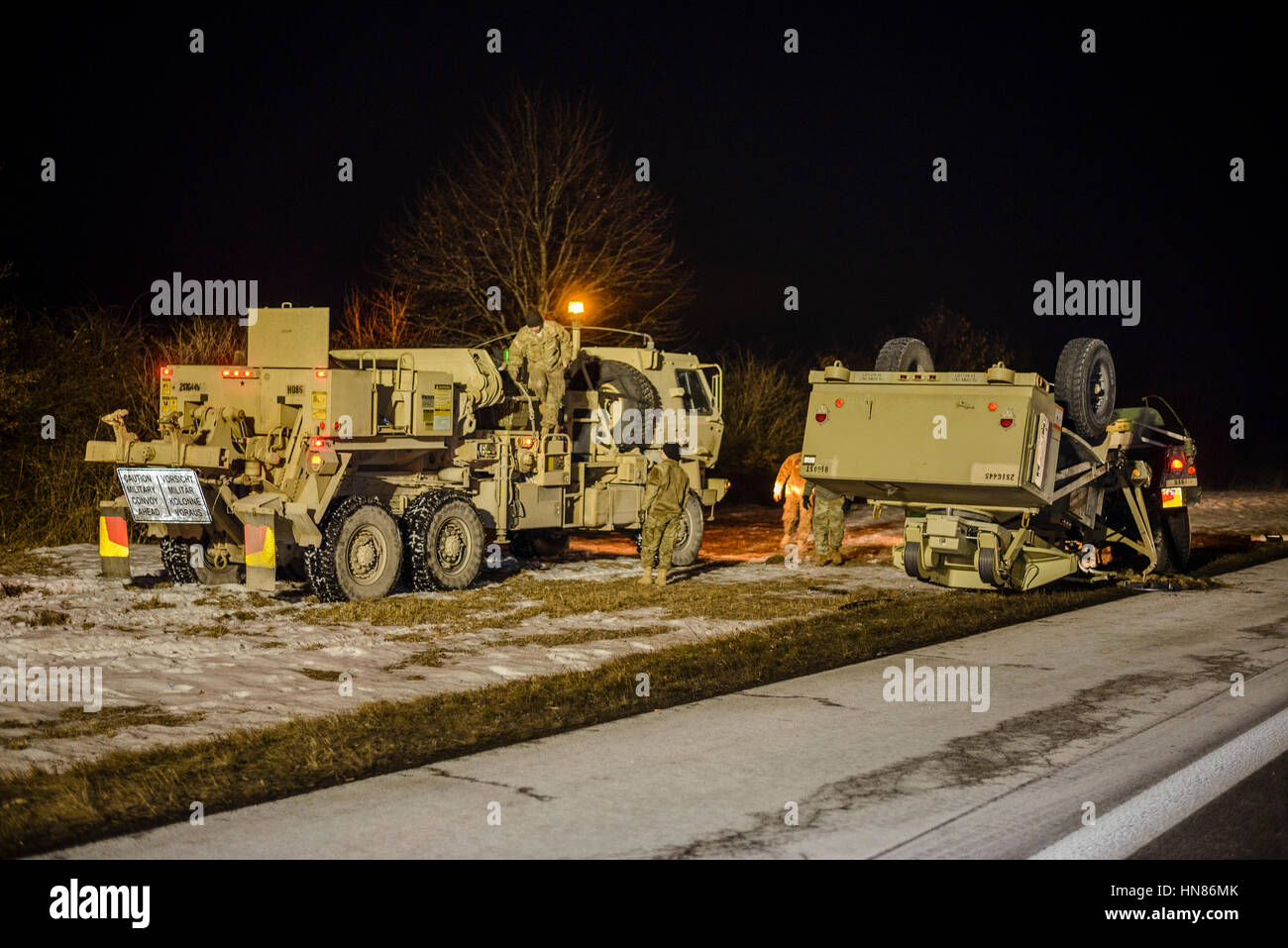 A US military vehicle seen next to a lane after an accident on the