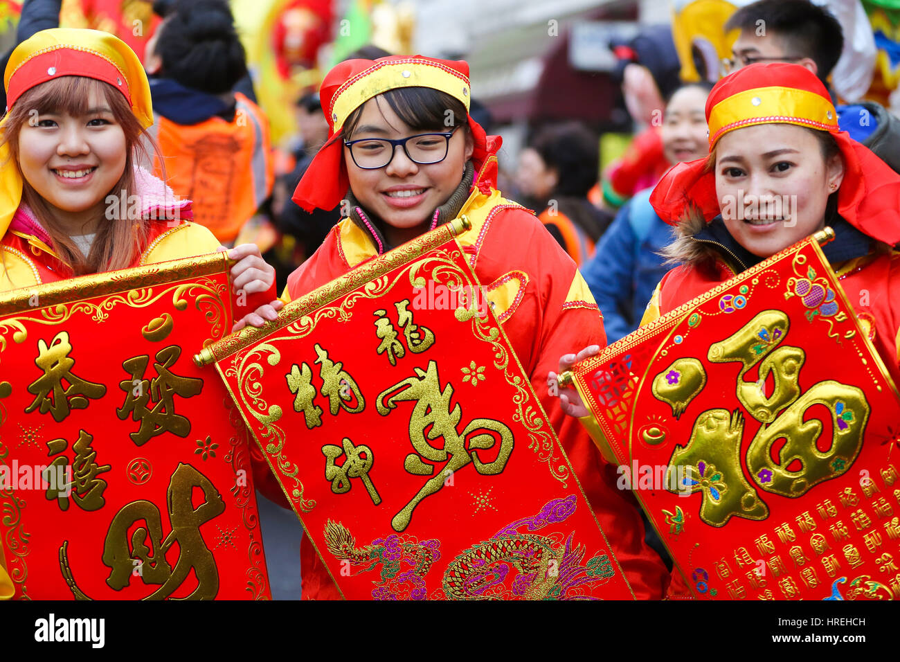 Costumed performers take part in the Chinese New Year Parade in Stock