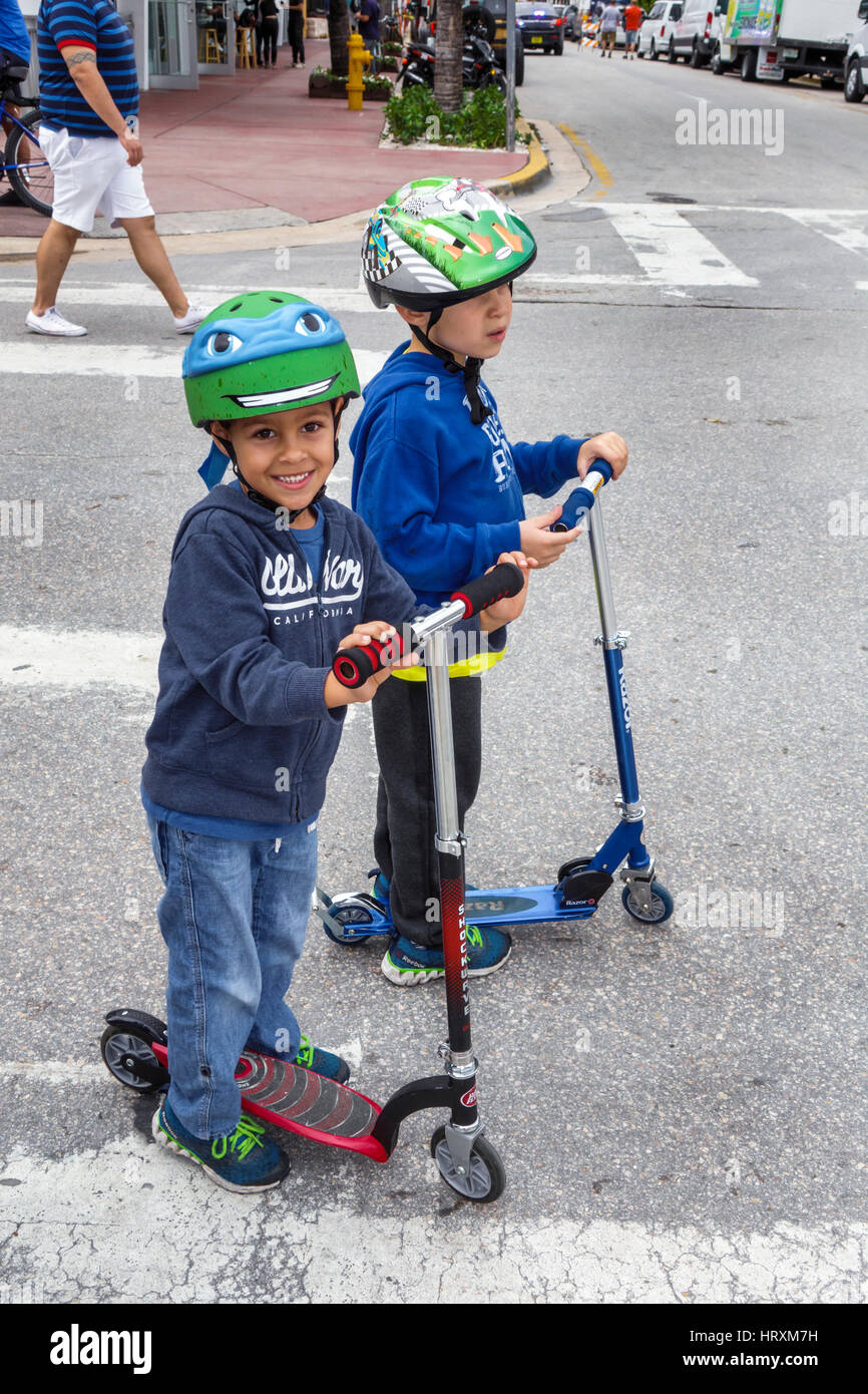 Miami Beach Florida Hispanic Boy Child Razor Scooter Helmet Safety Equipment Ninja Turtle Riding Friend Miami Beach Florida Hispanic Boy Child Razor Scooter Helmet Safety Equipment Ninja Turtle Riding Friend