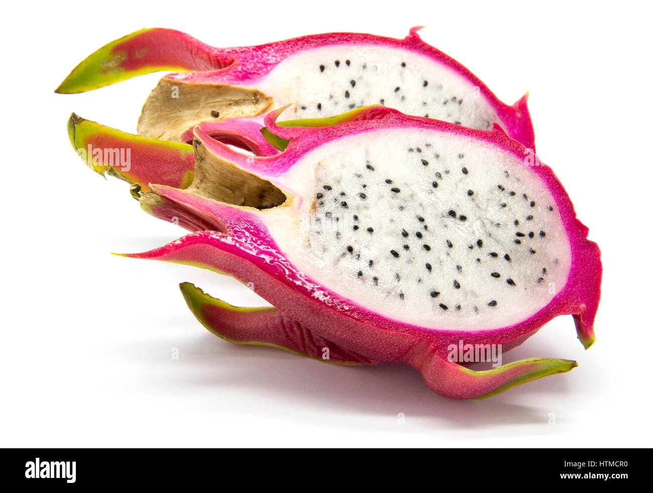 sliced pitahaya (dragon fruit) on white isolated background