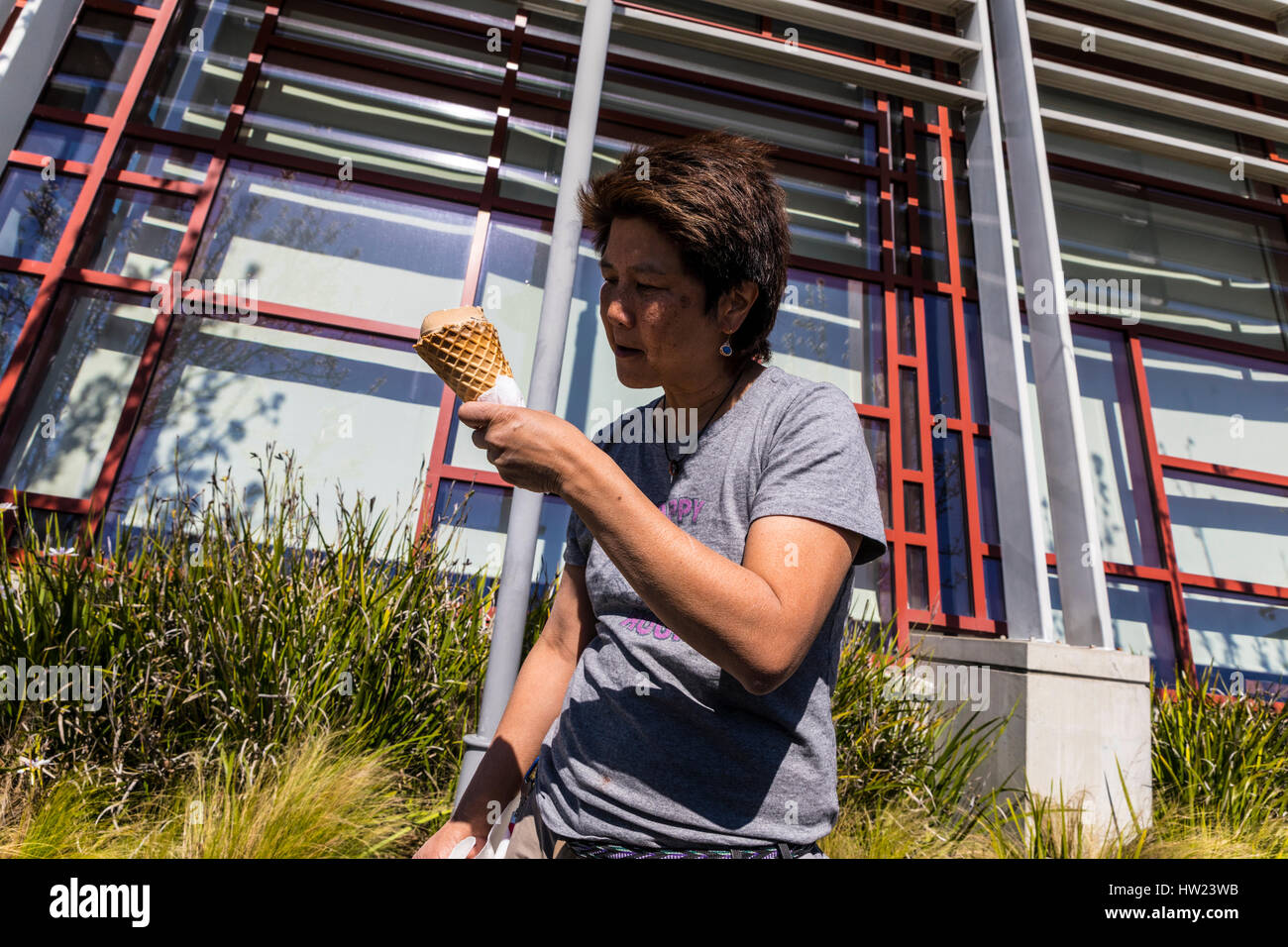 an-asian-woman-working-at-eating-a-very-