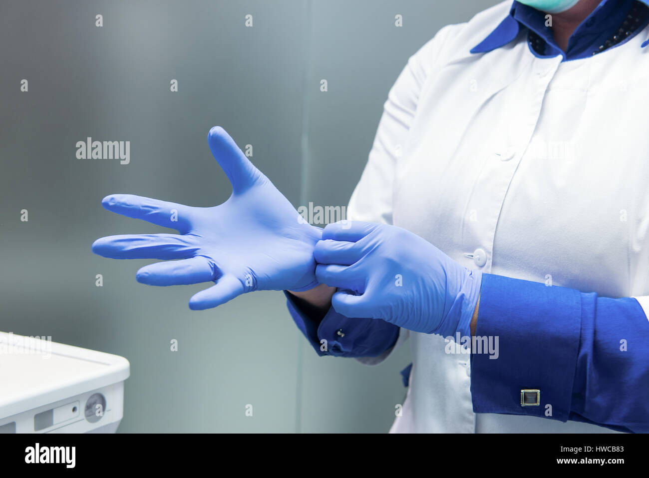Hands of doctor wearing gloves Stock Photo, Royalty Free Image