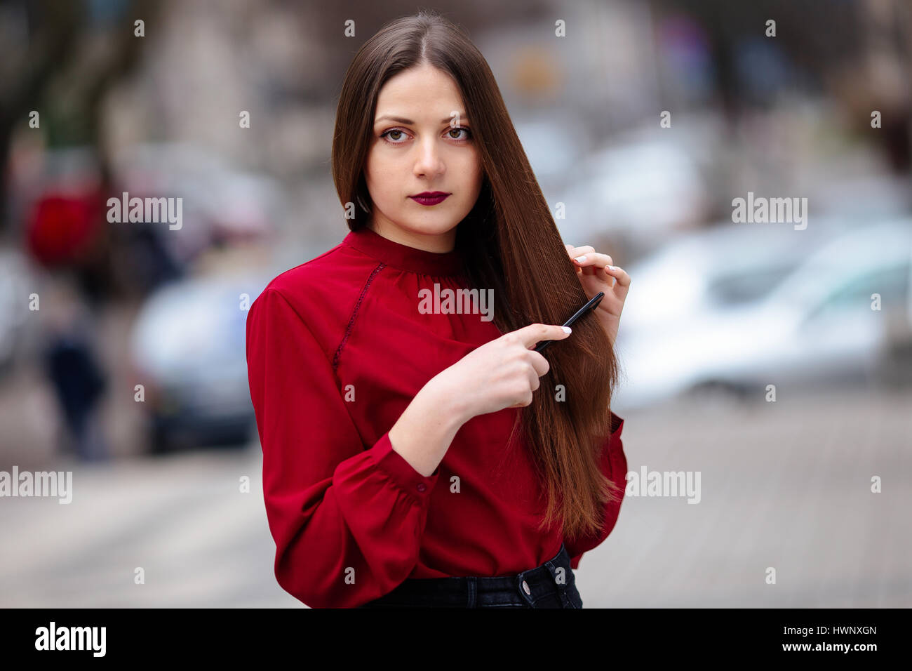 Female Brushing Long Brunette Hair Hi Res Stock Photography And Images