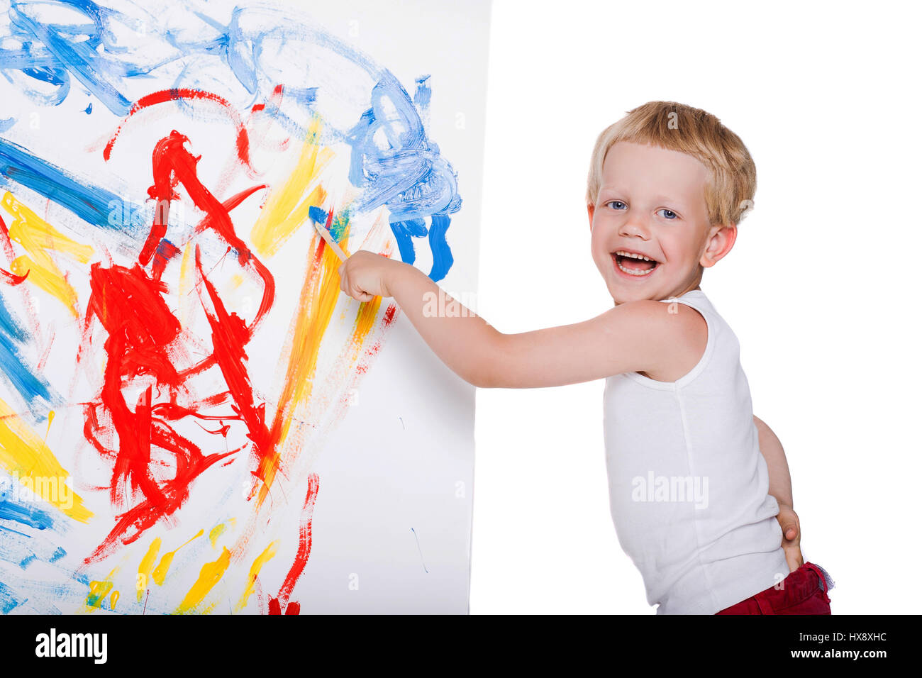 little messy kid painting with paintbrush picture on easel education creativity school preschool studio portrait over white background - Picture For Kid Painting little messy kid painting with paintbrush picture on easel education creativity school preschool studio portrait over white background - Picture For Kid Painting