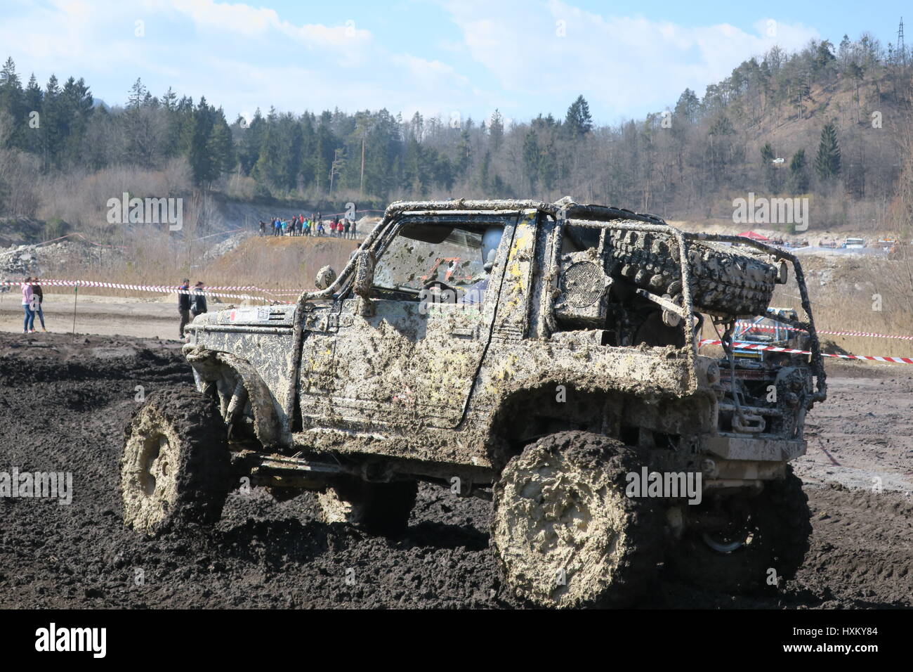The fourwheel drive is very muddy after driiving over mud in trench