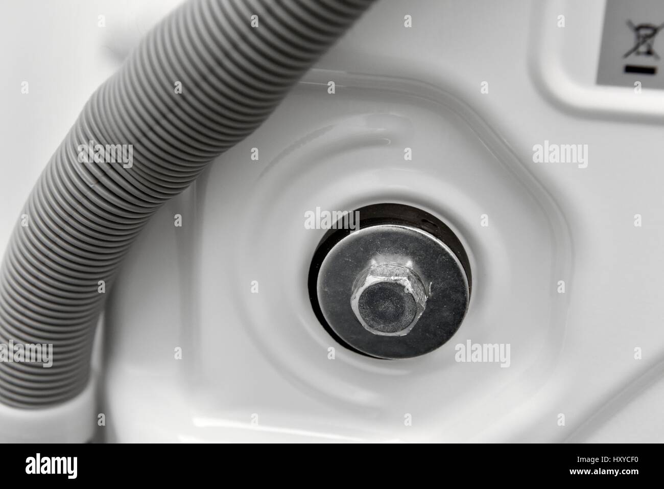 Transit bolts at the back of a domestic washing machine Stock Photo