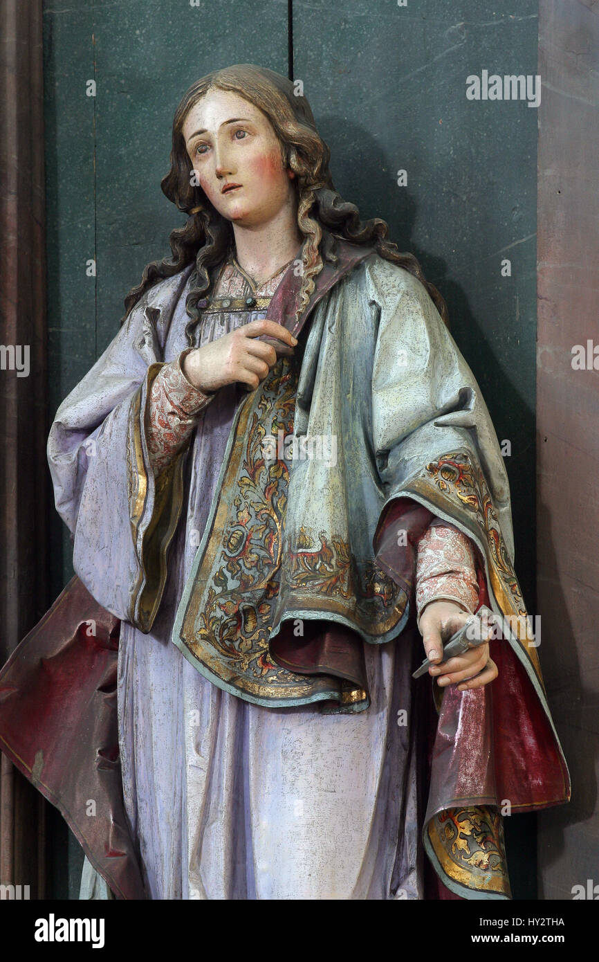 Saint Apollonia statue at the altar in the church of Saint Catherine