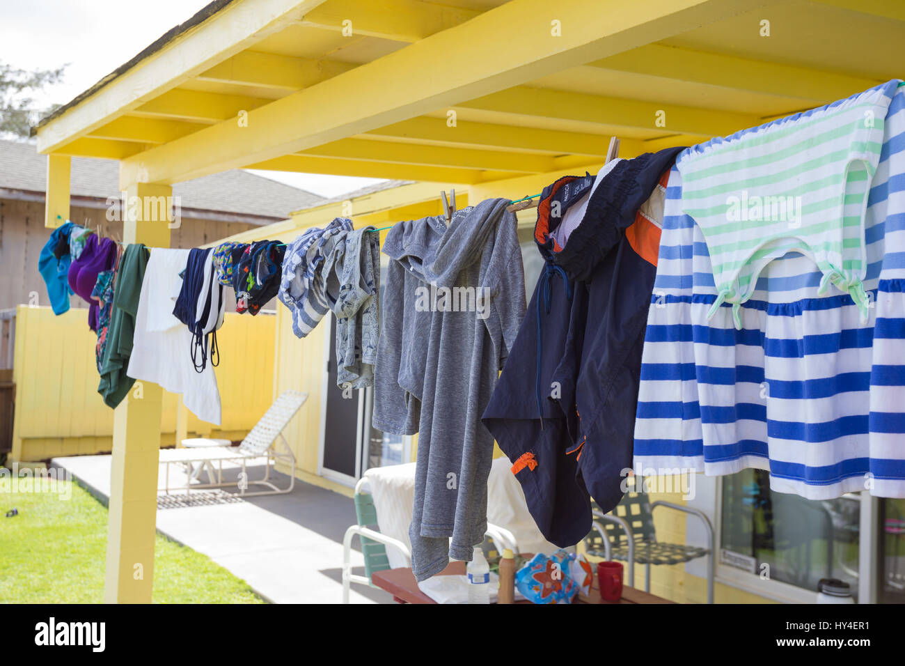 Clothesline of clothes drying in the sun on Oahu Hawaii Stock Photo