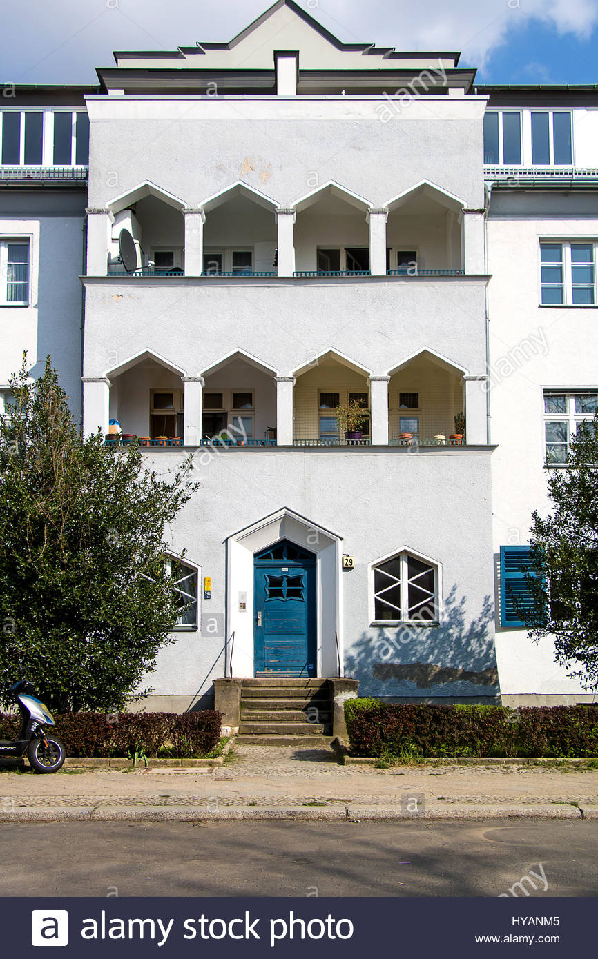 Stock photo urban housing area krugpfuhlsiedlung berlin neukölln britz city housing estate housefront with white light blue facade blue house front