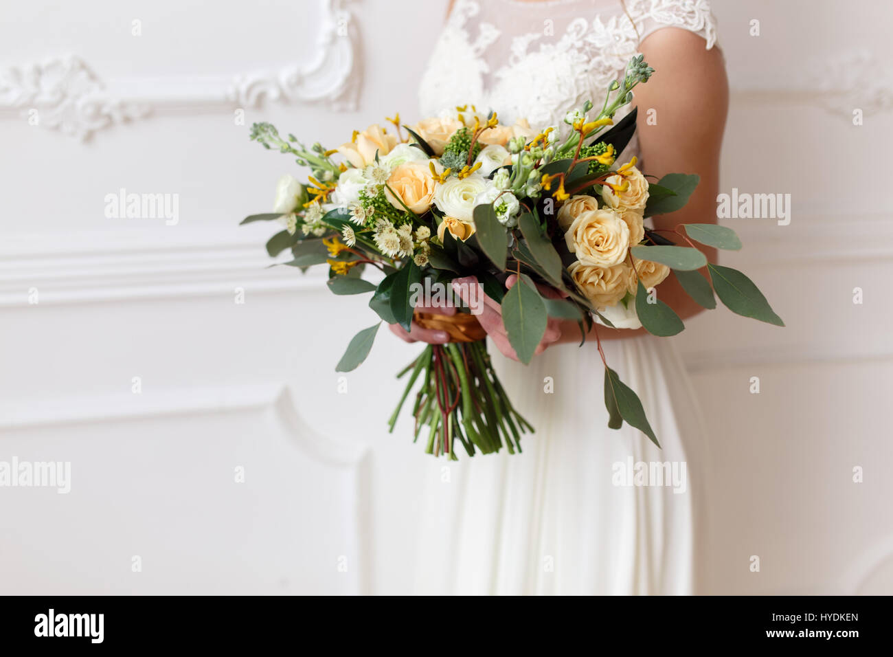 Bride Holding A Bouquet Of Flowers In Rustic Style Wedding With The White Room Bride Holding A Bouquet Of Flowers In Rustic Style Wedding With The White Room