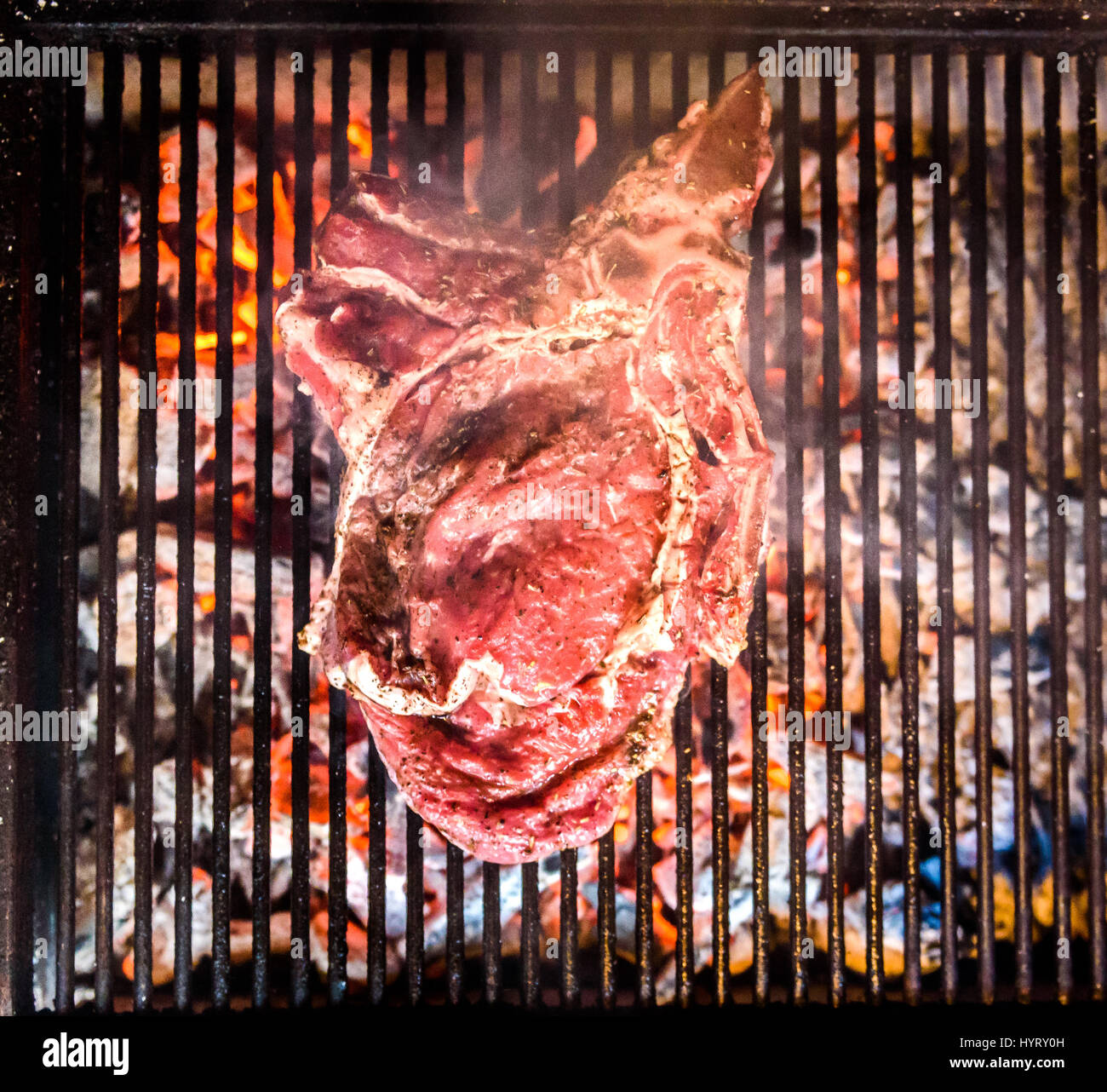 Grilling Big T Bone Steak On Natural Charcoal Barbecue Grill Preparing