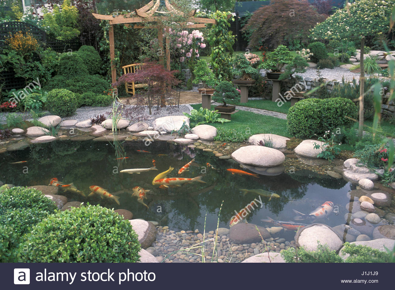 japanese style garden pool with koi carp patio covered by pergola chelsea 2002 wonderful world of koi designer rday and shickling bonsais rhododendrons - Japanese Koi Garden japanese style garden pool with koi carp patio covered by pergola chelsea 2002 wonderful world of koi designer rday and shickling bonsais rhododendrons - Japanese Koi Garden